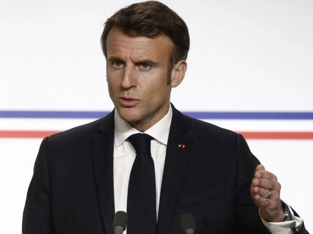 Le président français Emmanuel Macron s'exprimant depuis le palais de l'Élysée à Paris, le 22 janvier 2023. AP - Benoit Tessier